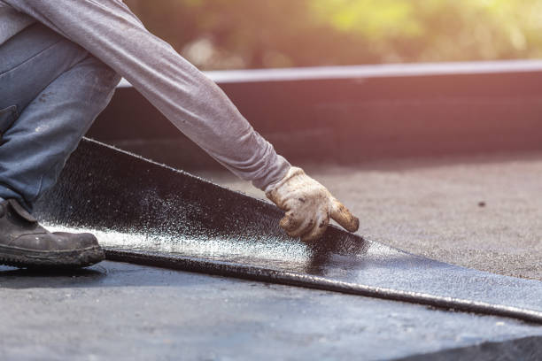 Professional Basement Waterproofing technician working in Eau Claire, MI